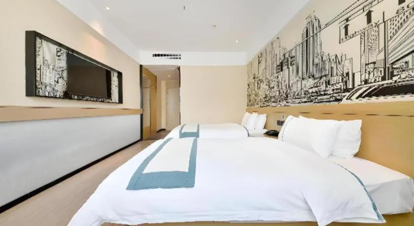 Bed in City Comfort Inn Wuhan Xinzhou Mo'er Cheng