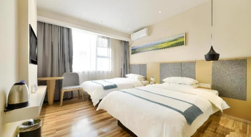 Bed in City Comfort Inn Wuhan Xinzhou Mo'er Cheng