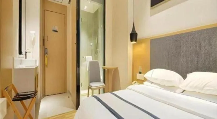 Bed in City Comfort Inn Wuhan Xinzhou Mo'er Cheng