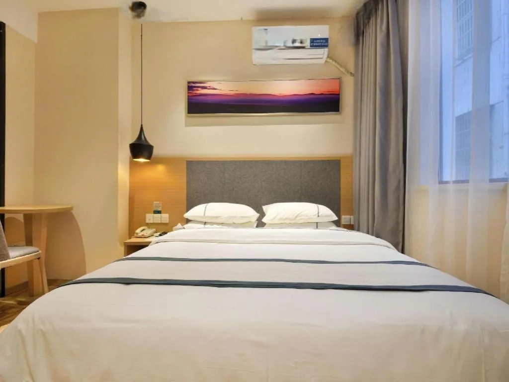 Bed in City Comfort Inn Wuhan Xinzhou Mo'er Cheng