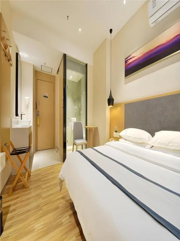 Bed in City Comfort Inn Wuhan Xinzhou Mo'er Cheng