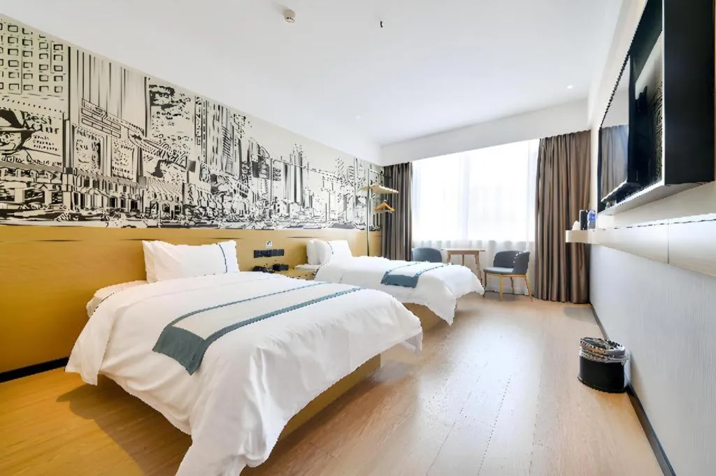 Bed in City Comfort Inn Wuhan Xinzhou Mo'er Cheng