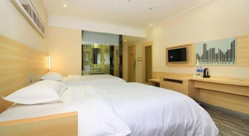 Bed in City Comfort Inn Huizhou Huiyang High-speed Railway Station