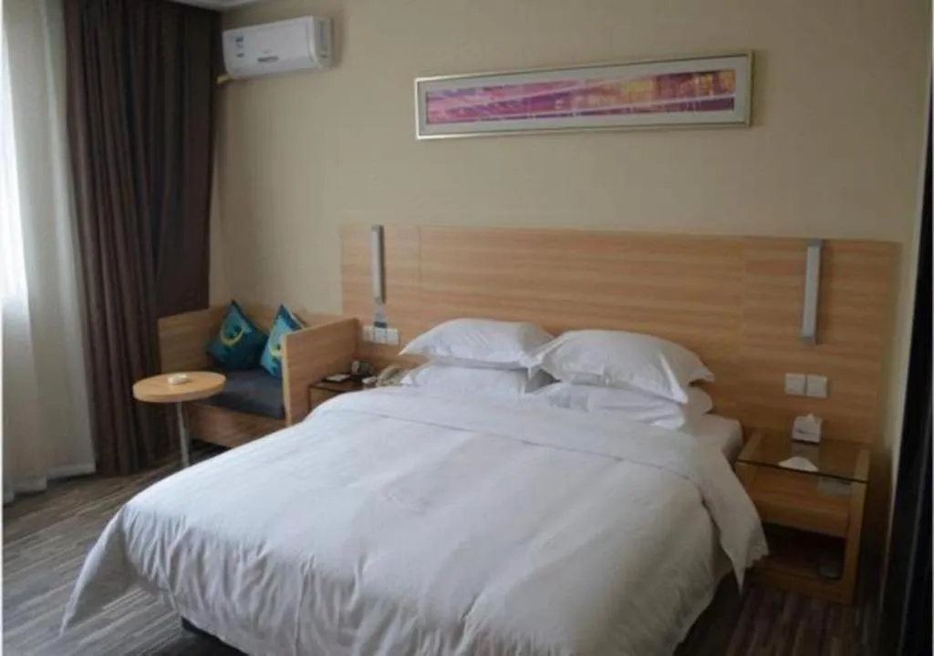 Bed in City Comfort Inn Huizhou Huiyang High-speed Railway Station