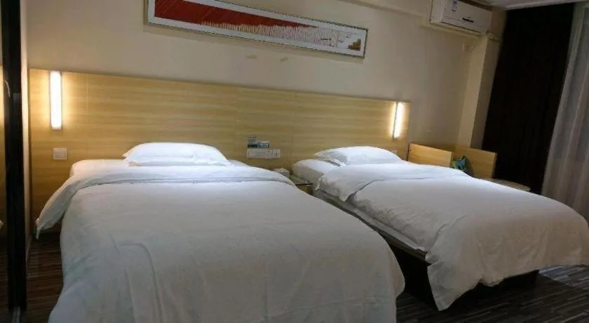 Bed in City Comfort Inn Huizhou Huiyang High-speed Railway Station