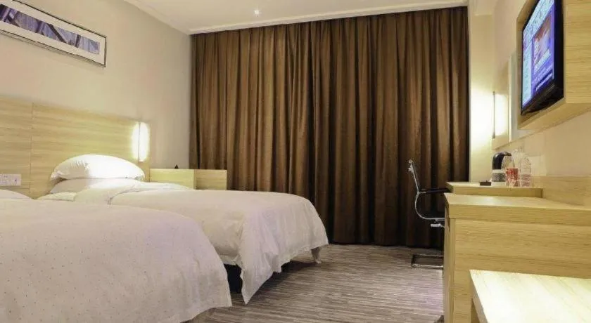 Bed in City Comfort Inn Huizhou Huiyang High-speed Railway Station