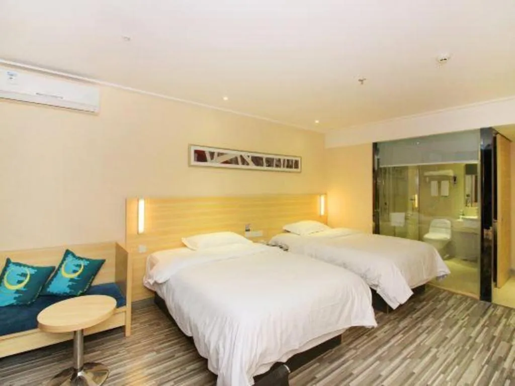 Bed in City Comfort Inn Huizhou Huiyang High-speed Railway Station