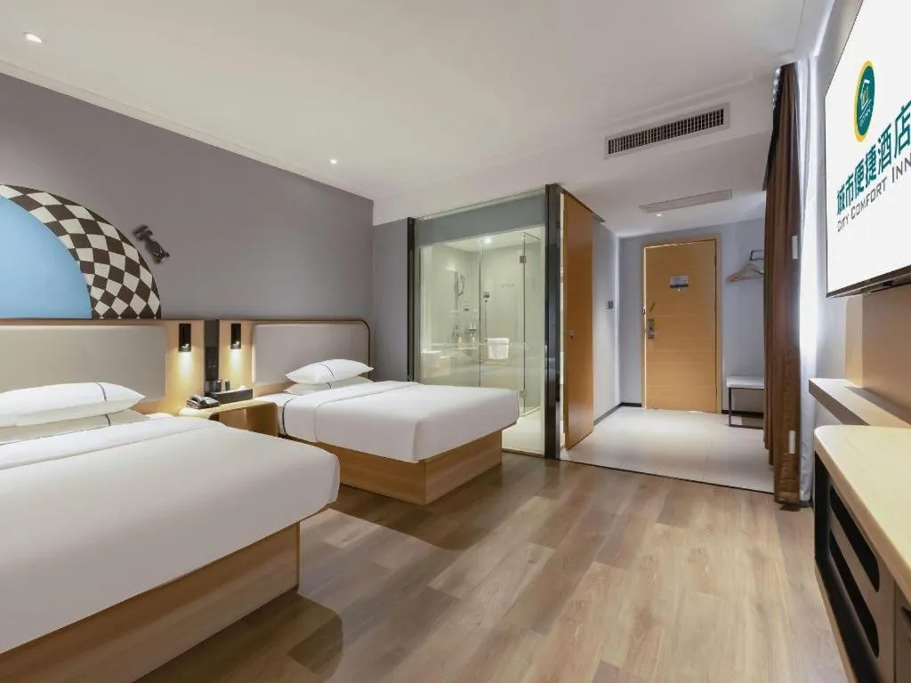 Bed in City Comfort Inn Guigang Pingnan Bus Station Jiangbin Park