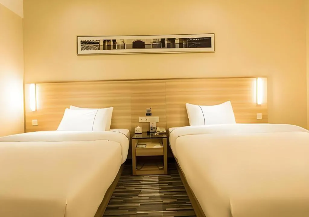 Bed in City Comfort Inn Guigang Pingnan Bus Station Jiangbin Park