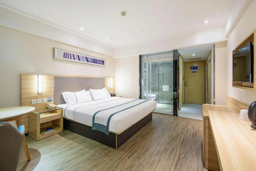 Bed in City Comfort Inn Wuzhou Arcade City Sanzongfu