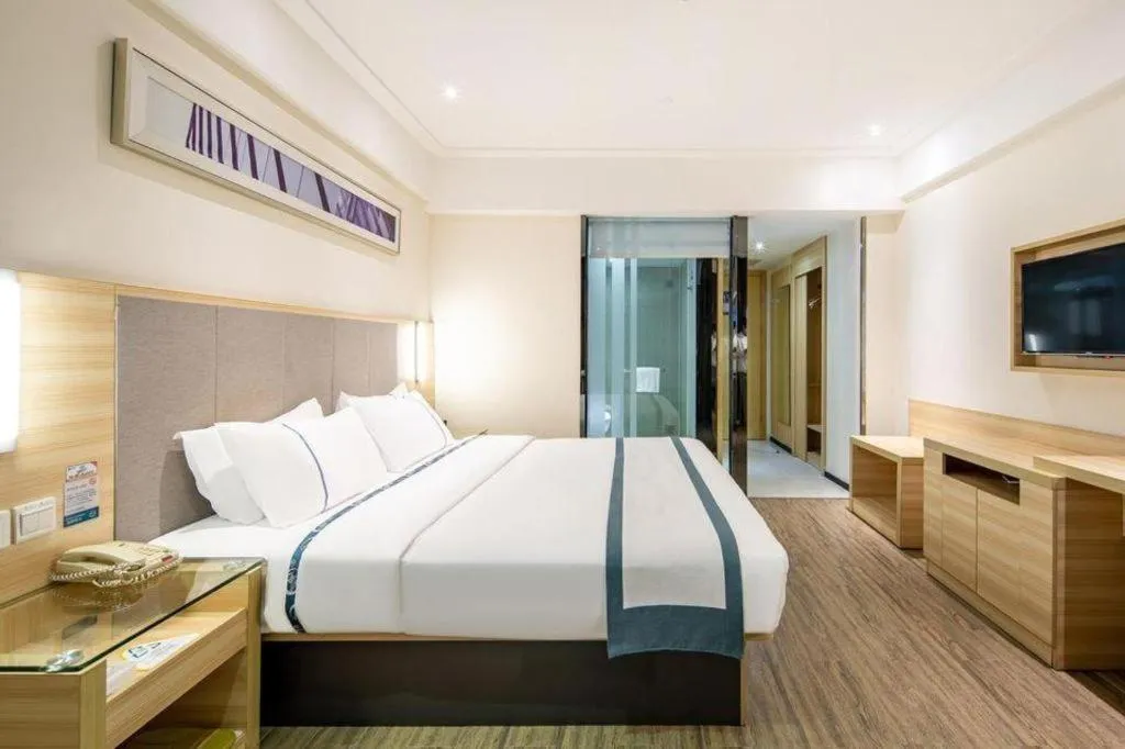 Bed in City Comfort Inn Wuzhou Arcade City Sanzongfu