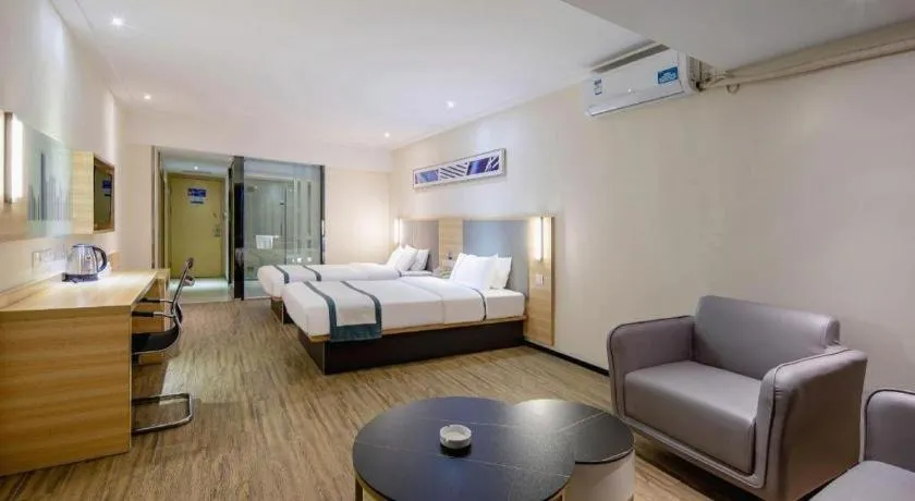 Bed in City Comfort Inn Wuzhou Arcade City Sanzongfu