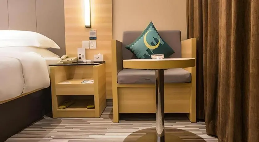 Bed in City Comfort Inn Wuzhou Arcade City Sanzongfu