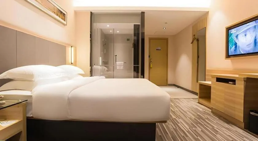 Bed in City Comfort Inn Wuzhou Arcade City Sanzongfu