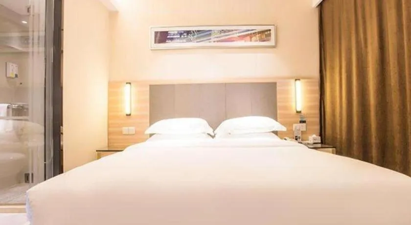 Bed in City Comfort Inn Wuzhou Arcade City Sanzongfu