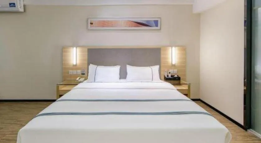 Bed in City Comfort Inn Wuzhou Arcade City Sanzongfu