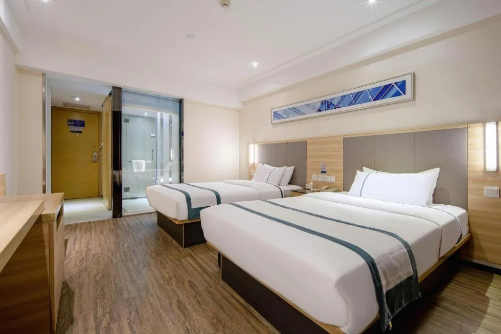 Bed in City Comfort Inn Wuzhou Arcade City Sanzongfu