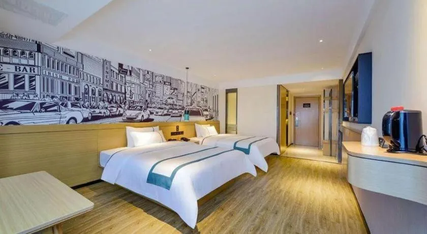 Bed in City Comfort Inn Zunyi Wuchuan