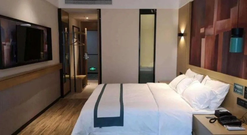 Bed in City Comfort Inn Zunyi Wuchuan