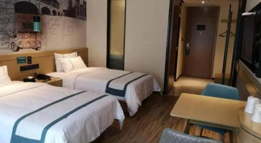 Bed in City Comfort Inn Zunyi Wuchuan