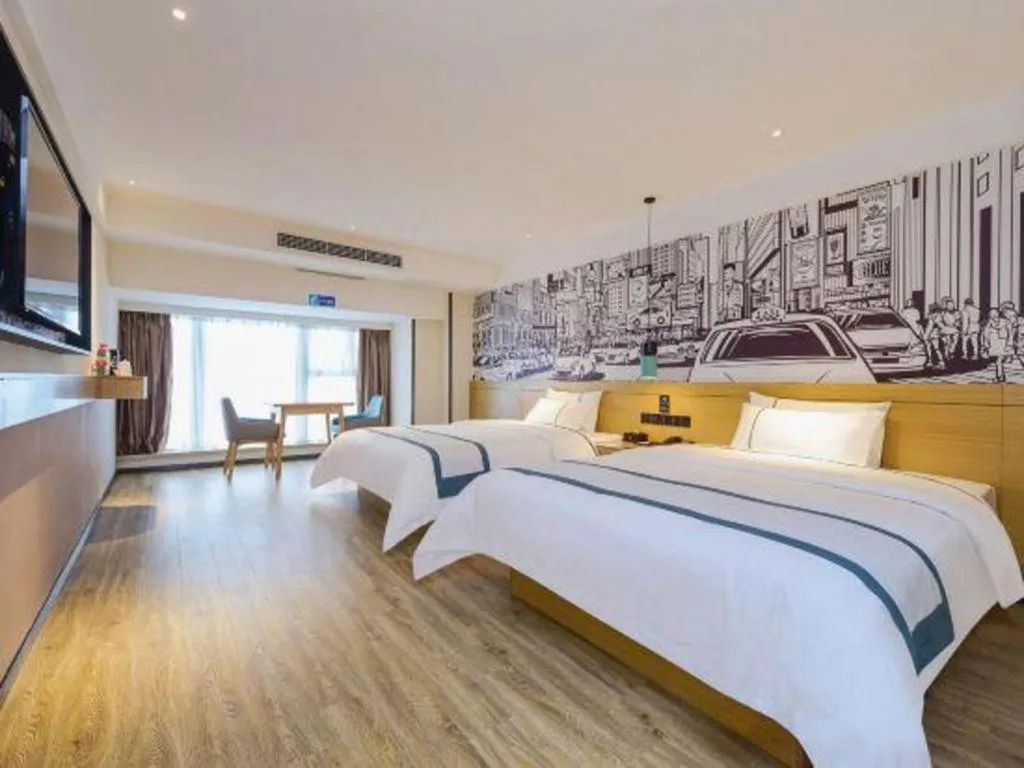 Bed in City Comfort Inn Zunyi Wuchuan