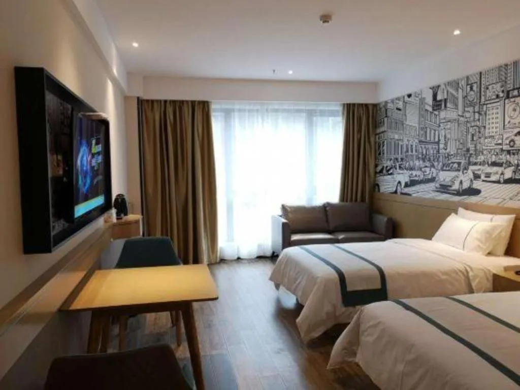 Bed in City Comfort Inn Zunyi Wuchuan