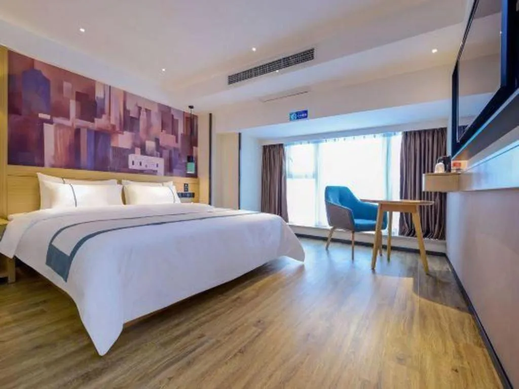 Bed in City Comfort Inn Zunyi Wuchuan