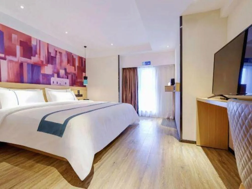 Bed in City Comfort Inn Zunyi Wuchuan