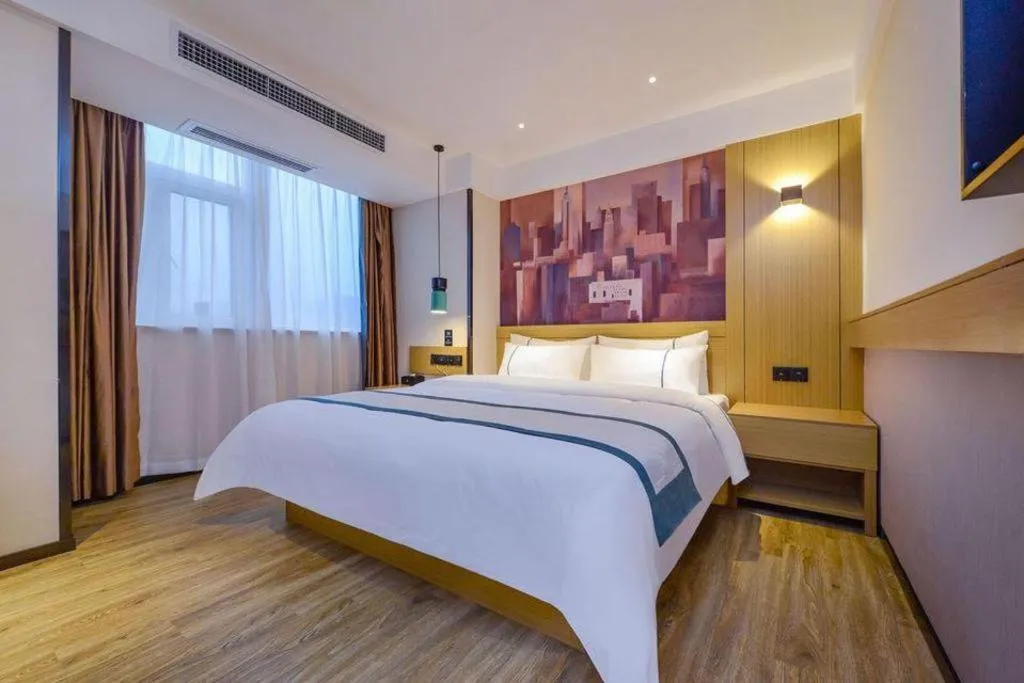 Bed in City Comfort Inn Zunyi Wuchuan