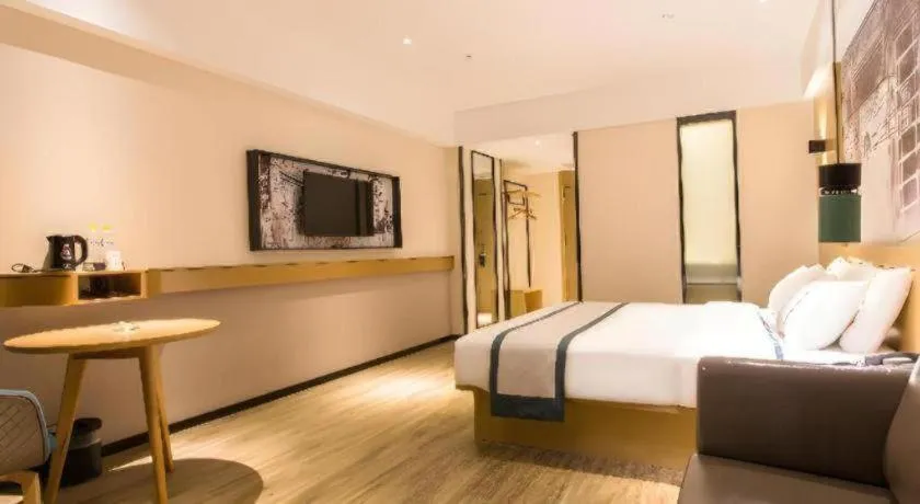 Bed in City Comfort Inn Nanning Kede Zoo Qingchuan Metro Station