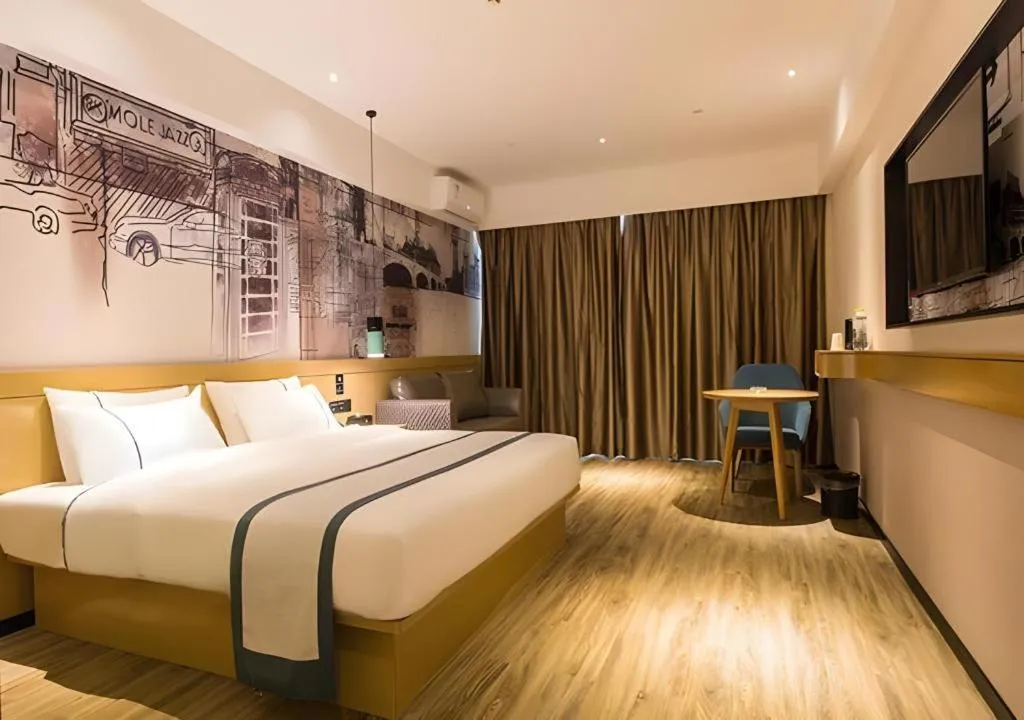 Bed in City Comfort Inn Nanning Kede Zoo Qingchuan Metro Station