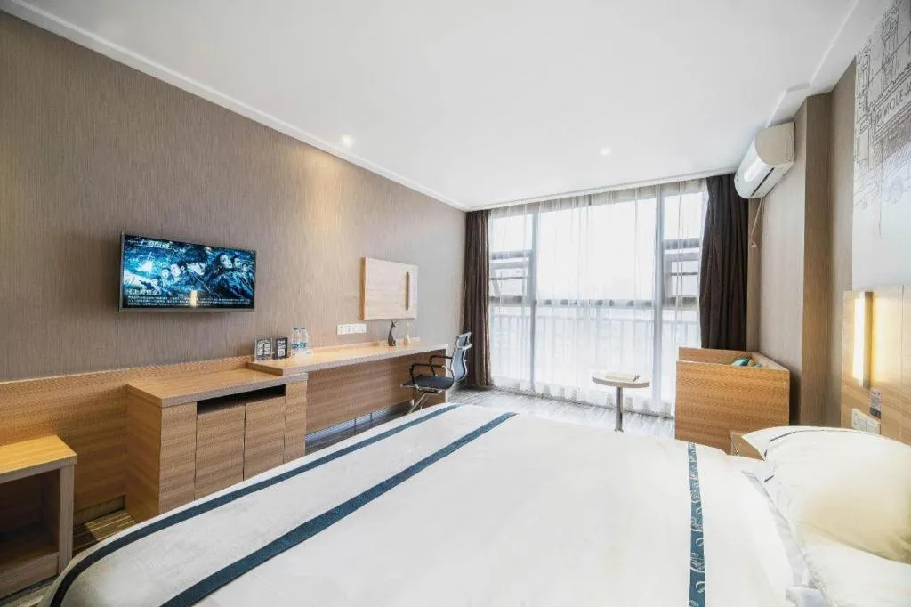 Bed in City Comfort Inn Lichuan Railway Station Tenglong Cave