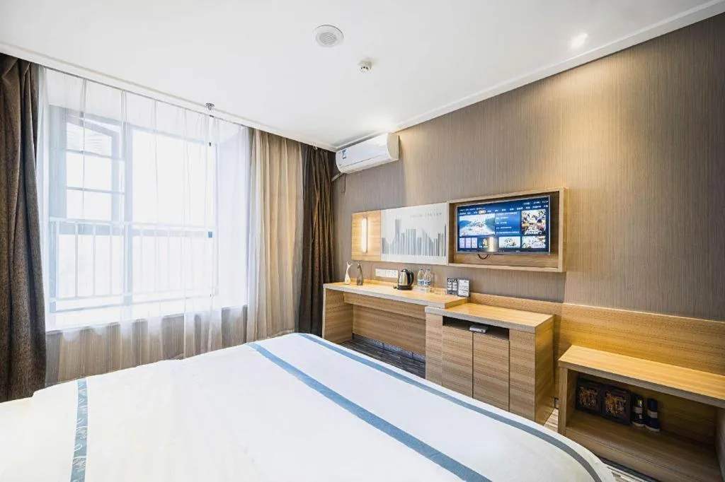 Bed in City Comfort Inn Lichuan Railway Station Tenglong Cave