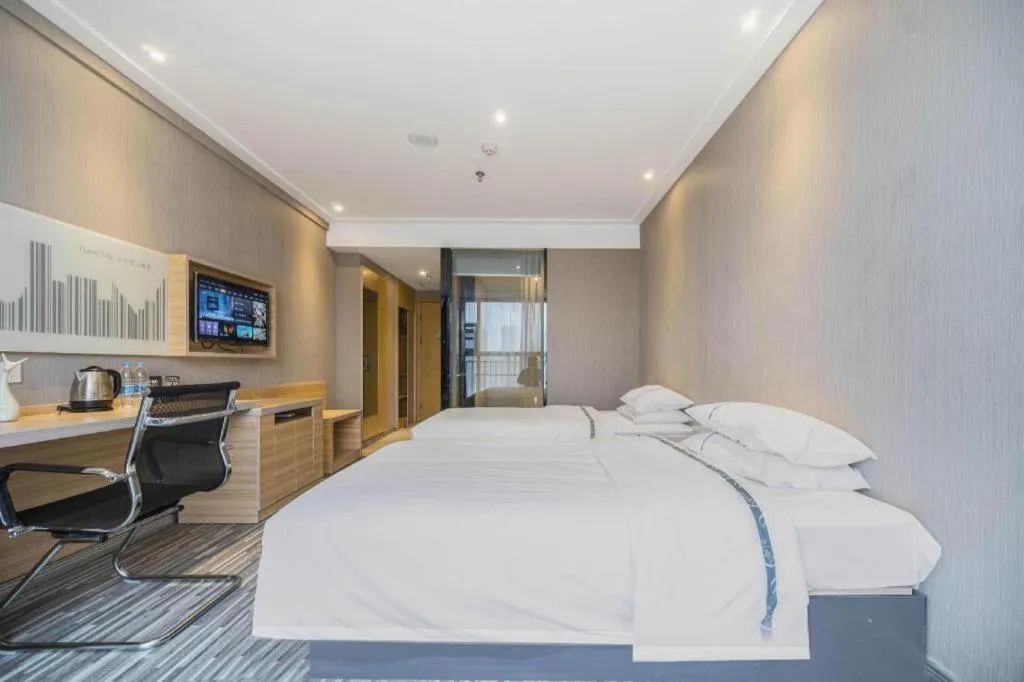 Bed in City Comfort Inn Lichuan Railway Station Tenglong Cave