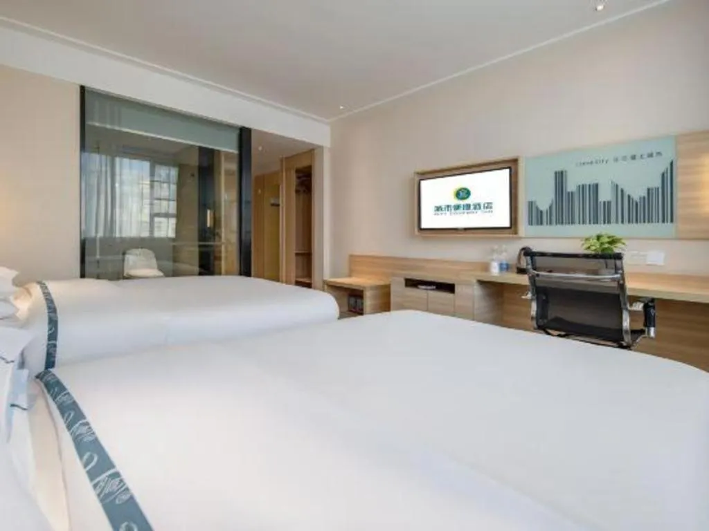 Bed in City Comfort Inn Hezhou High Speed Railway Station