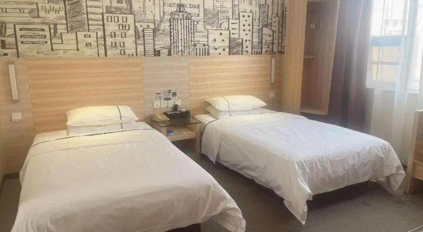 Bed in City Comfort Inn Huanggang Dongmen Road Wanda Plaza