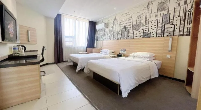 Bed in City Comfort Inn Huanggang Dongmen Road Wanda Plaza