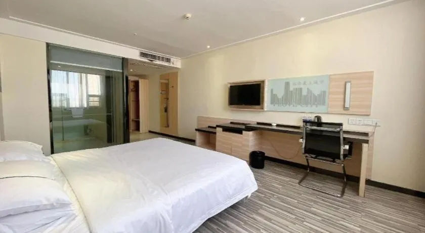 Bed in City Comfort Inn Huanggang Dongmen Road Wanda Plaza