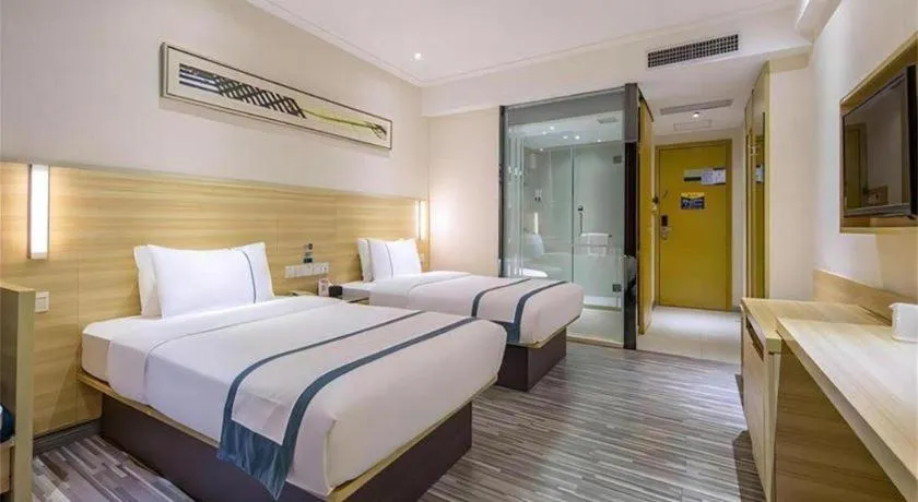 Bed in City Comfort Inn Huanggang Dongmen Road Wanda Plaza