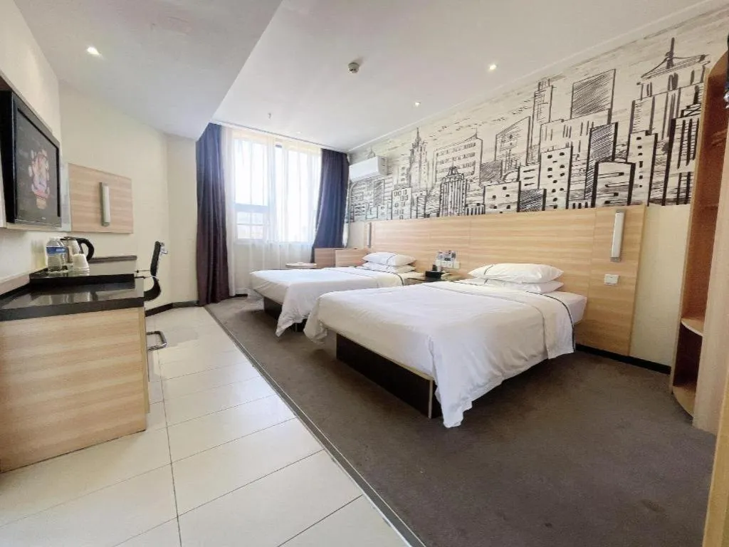 Bed in City Comfort Inn Huanggang Dongmen Road Wanda Plaza