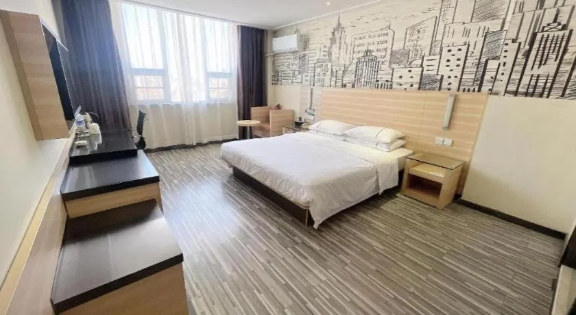 Bed in City Comfort Inn Huanggang Dongmen Road Wanda Plaza