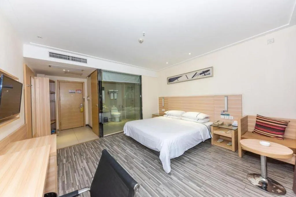 Bed in City Comfort Inn Huanggang Dongmen Road Wanda Plaza