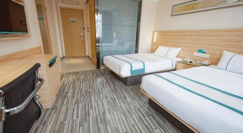 Bed in City Comfort Inn Huanggang Dongmen Road Wanda Plaza