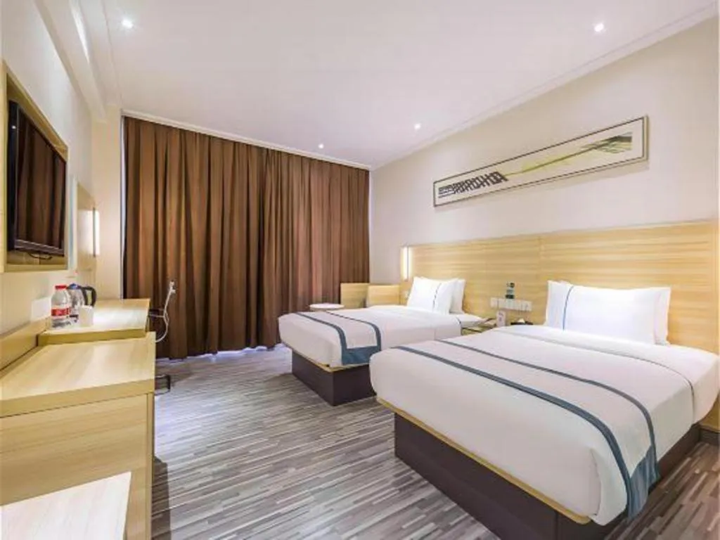 Bed in City Comfort Inn Huanggang Dongmen Road Wanda Plaza