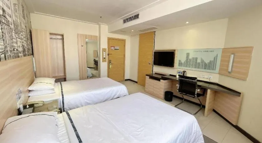 Bed in City Comfort Inn Huanggang Dongmen Road Wanda Plaza