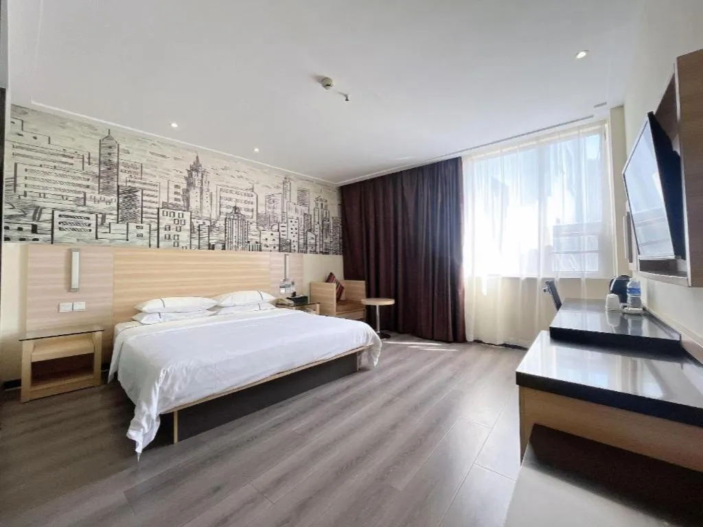 Bed in City Comfort Inn Huanggang Dongmen Road Wanda Plaza