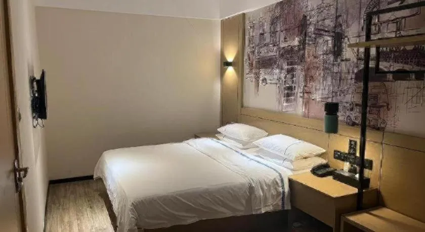 Bed in City Comfort Inn Dongguan Tangxia Garden Street