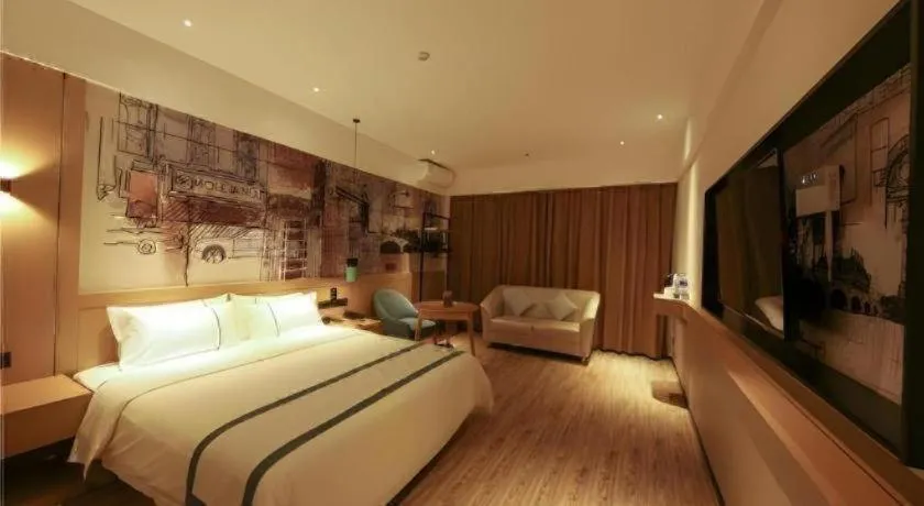 Bed in City Comfort Inn Dongguan Tangxia Garden Street