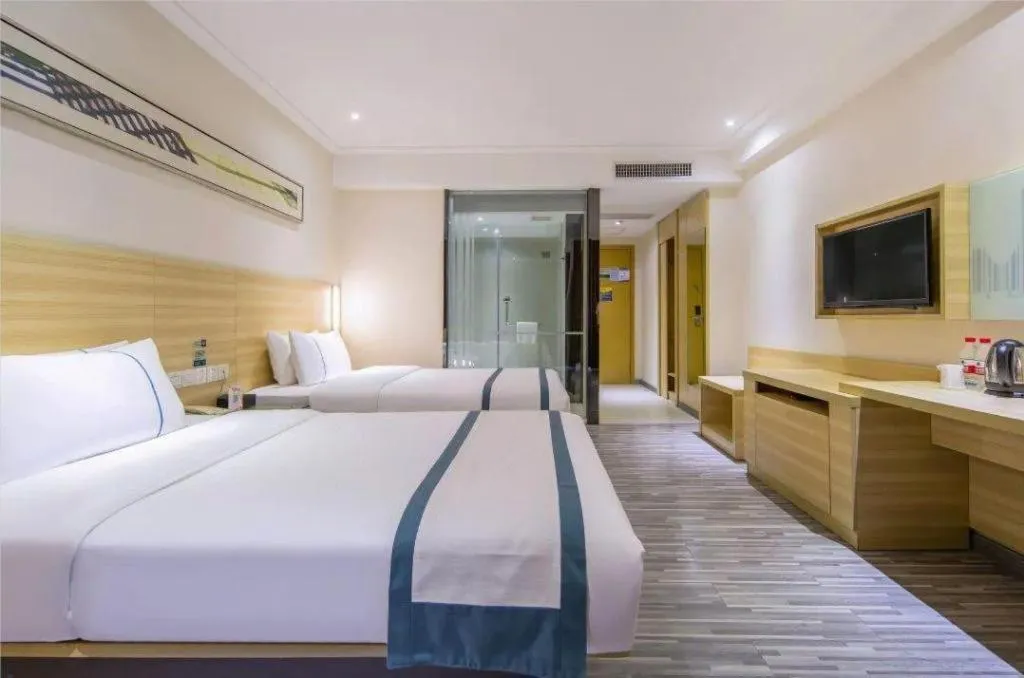 Bed in City Comfort Inn Zhuhai Hengqin Ocean Kingdom Huafa Shangdu