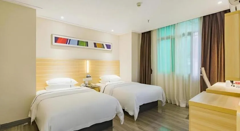 Bed in City Comfort Inn Zhuhai Hengqin Ocean Kingdom Huafa Shangdu